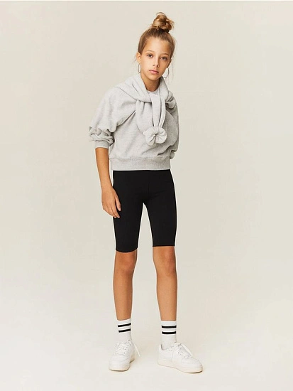 картинка Шорты-велосипедки черные для девочек от известного бренда одежды для девочек Mark Formelle