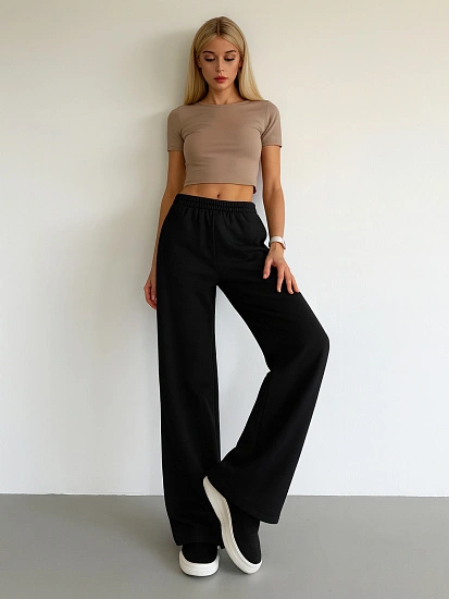 картинка Теплые брюки клеш женские черные от магазина стильной одежды Mark Formelle