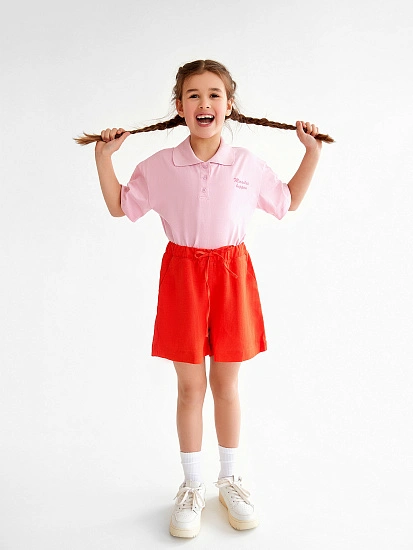 картинка Шорты для девочек оранжевые от известного бренда одежды для девочек Mark Formelle