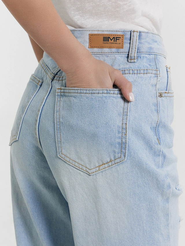 Джинсы женские голубые с рваными деталями - 7