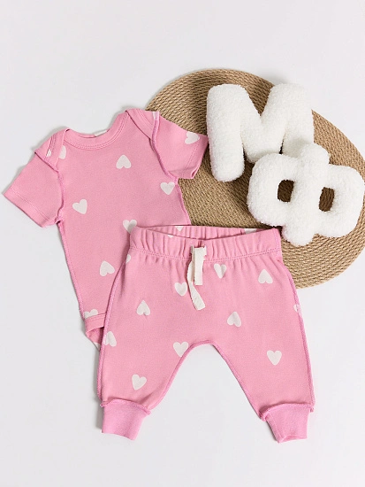 картинка Комплект детский розовый в сердечки: боди и ползунки  от магазина Одежда+