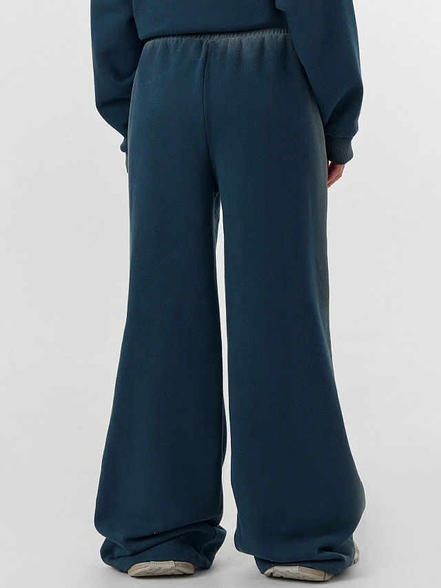 Брюки женские зеленые с декоративными потертостями - 3