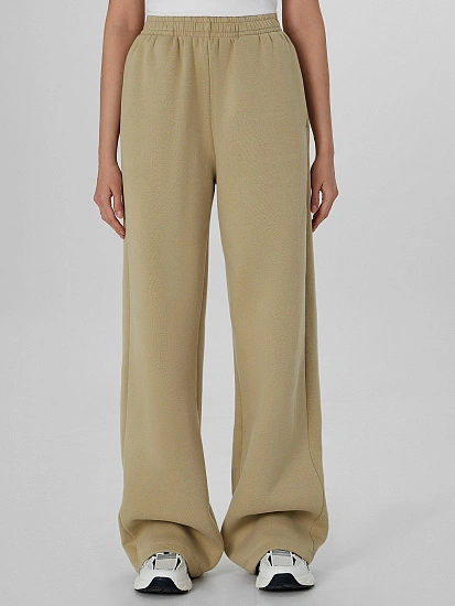 картинка Теплые брюки для девочек зеленые с начесом от известного бренда одежды для девочек Mark Formelle